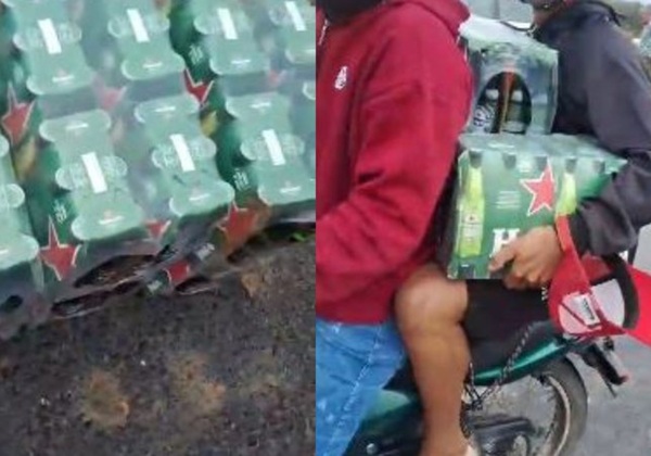 Caminhão carregado de cerveja tomba e carga é saqueada na BR-116